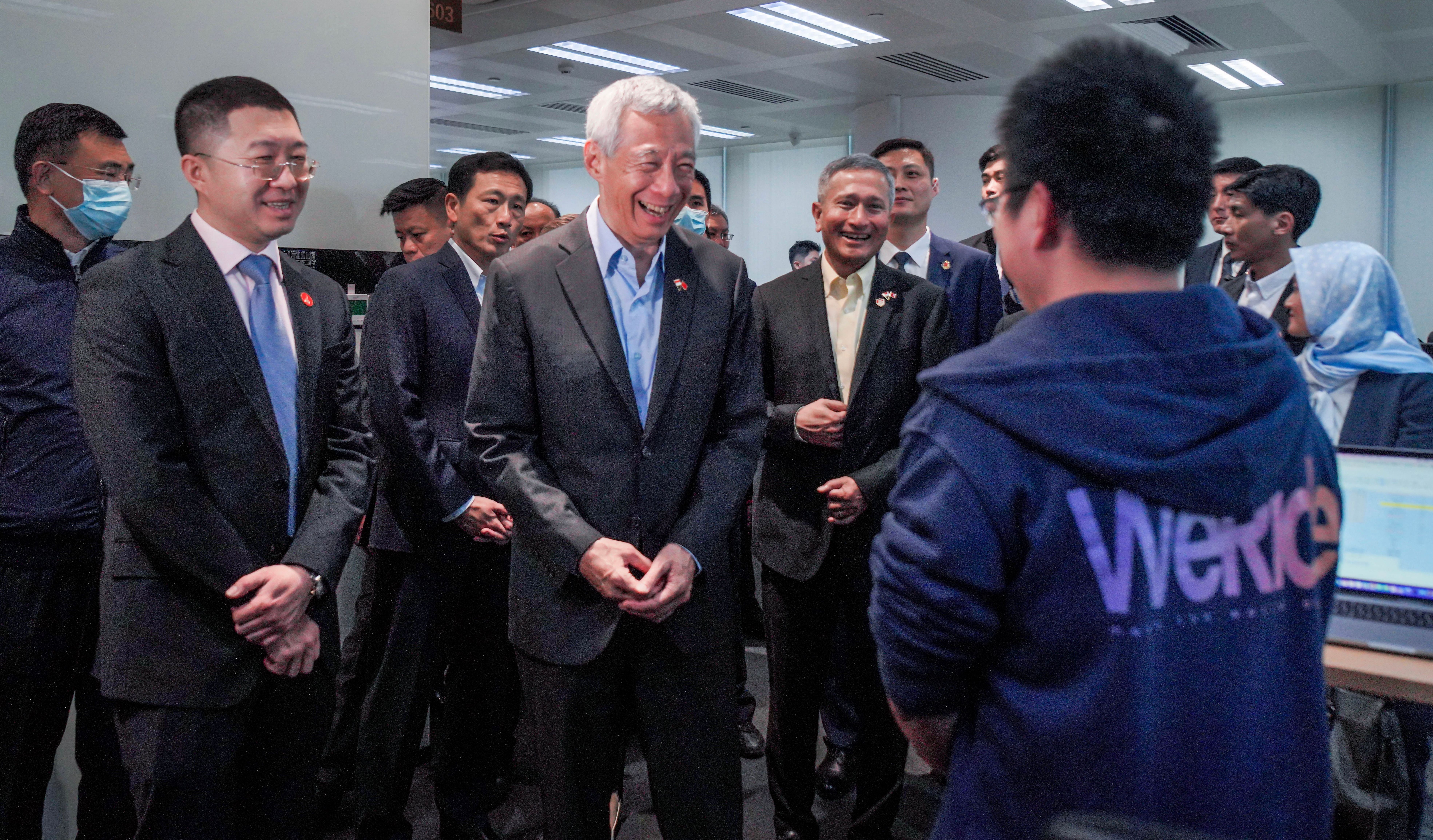 Singapore's Prime Minister Lee Hsien Loong took a ride in WeRide's Robobus as his first stop in China